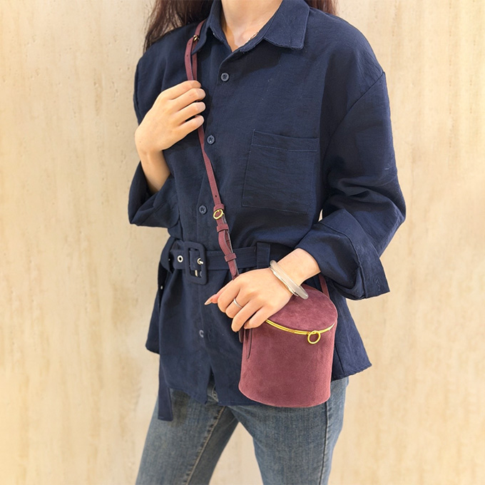 alaïa cylindrical bucket crossbody handbag
